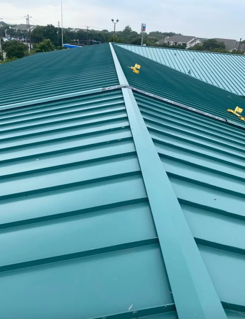 Green commercial metal roof ridge and valley for Metal Roof Repair in Woodbridge