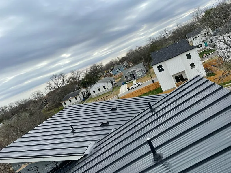 Standing seam metal roof panels with vents for Skylight Repair in Woodbridge